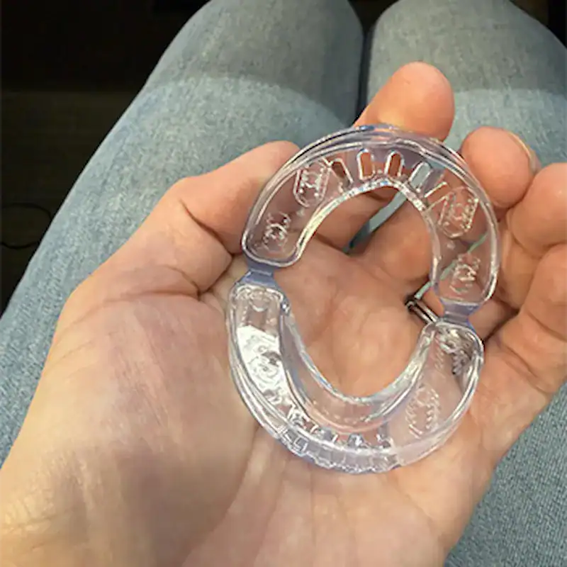 Femme qui se réveille reposée grâce à la Silentia Pro